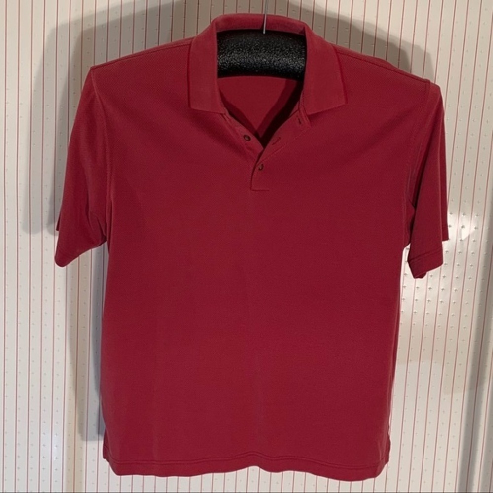 AXIS red polo shirt.